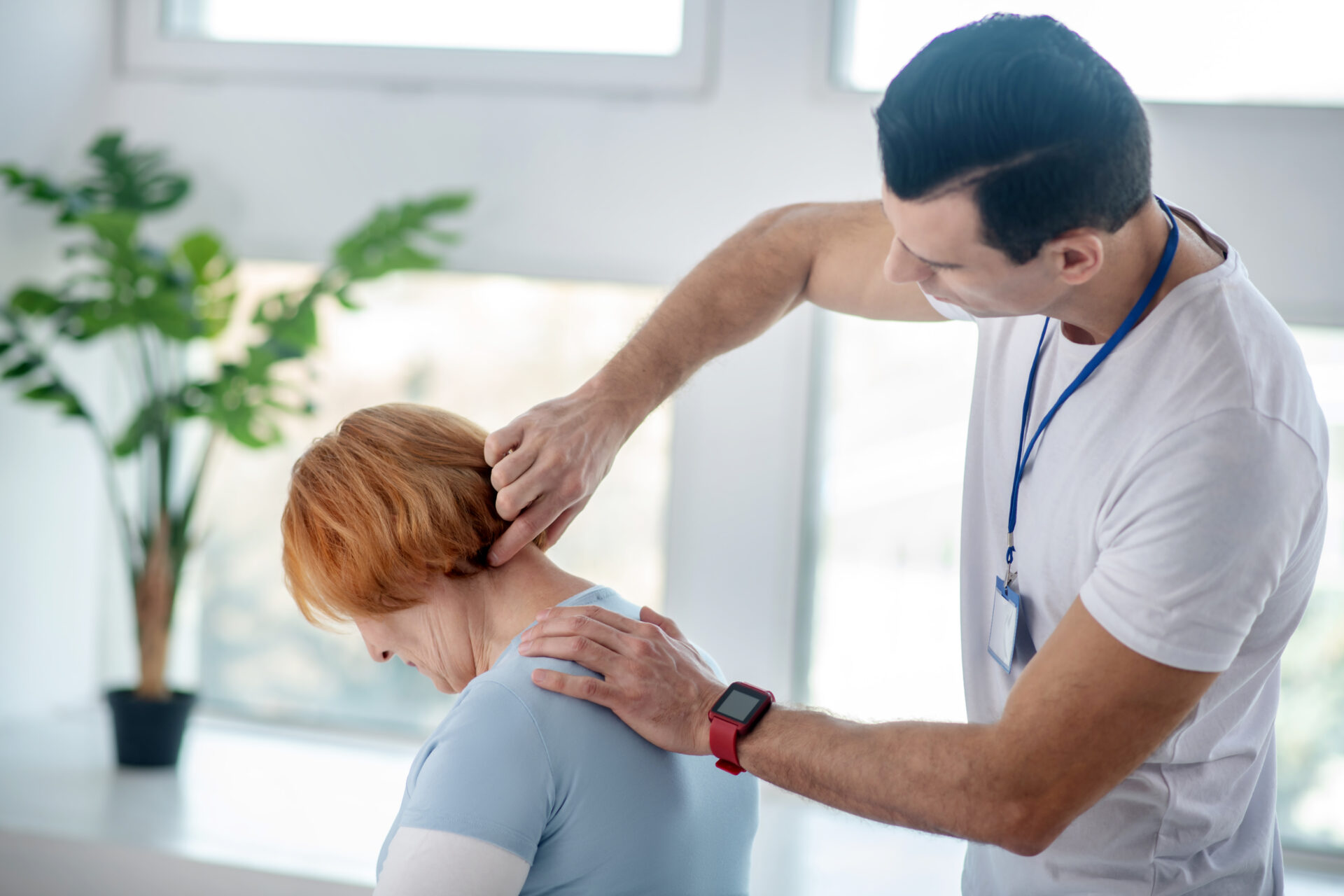 Accident chiropractor with his patient